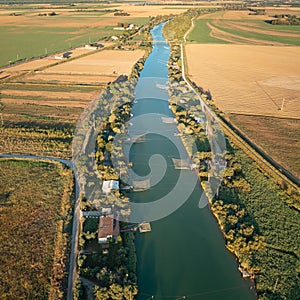 Aerial shot of fishing huts on river photo
