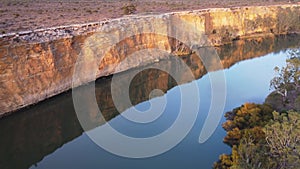 aerial shot flying forward and close to cliffs at big bend murray river