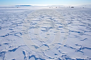 aerial shot of frozen airstrips in the arctic