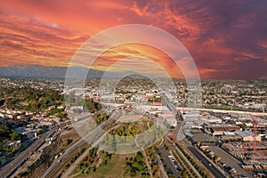 Aerial shot gorgeous autumn landscape at Los Angeles State Historic Park surrounded by streets with cars driving