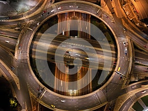 Aerial shot of the highway of Attiki Odos multilevel junction ring road at night in Greece.