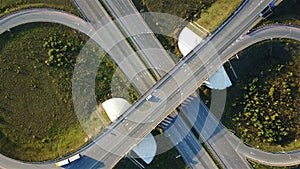 Aerial shot of highway junction with cars top view in the form of a sign of infinity