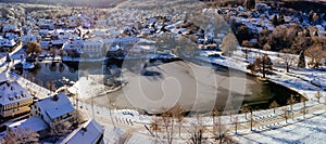 Aerial shot of Ilsenburg in winter on a sunny day in Harz, Saxony-Anhalt,Germany