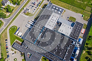 Aerial Shot of Industrial Loading Area where Many Trucks Are Unloading Merchandise