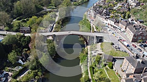 Aerial shot of Ironbridge in Shropshire in England surrounded by a long river and a small town