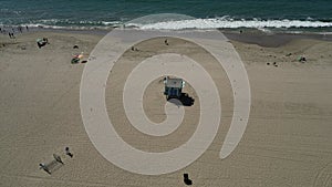 Aerial shot of a lifeguard tower at Santa Monica State Beach in California