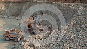 Aerial Shot Loading Heavy Dump Truck At The Opencast Mining Site