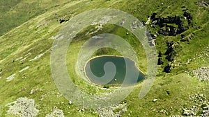 Aerial shot Macedonia. The flight of a drone over a beautiful mountain blue lake