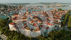 Aerial shot of magnificent Venetian city on the Adriatic Sea - Trogir, Croatia. Morning shot of old town Trogir with