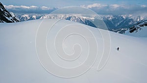 Aerial shot male sportsman enjoying ride on mountain skiing on empty track