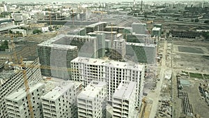Aerial shot of modern apartment buildings construction site