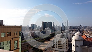 Aerial shot of modern city architecture Abu Dhabi city clouds, time lapse