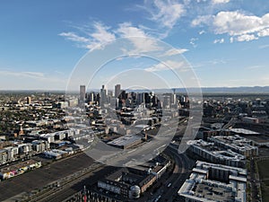 Aerial shot of the modern cityscape of Denver under the blue cloudy sky in Colorado, USA