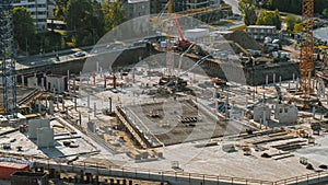 Aerial Shot of a New Constructions Development Site with High Tower Cranes Building Real Estate. H