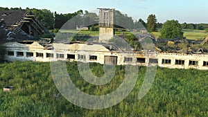 Aerial shot of an old forgotten farm building.