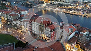 Aerial shot over illuminated street in Porto