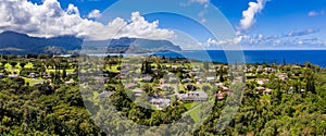 Aerial shot over Princeville with Hanalei Bay on north shore of Kauai in Hawaii