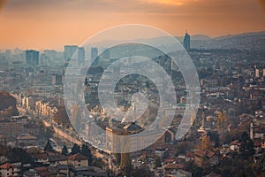 Aerial shot over the sarajevo cityscape at sunset