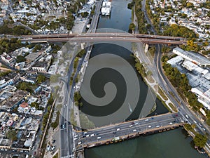 Aerial shot of the Ozama River surrounded by buildings in the Dominican Republic