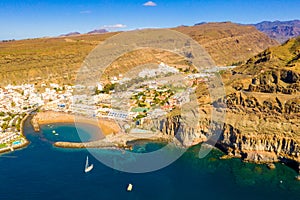 Aerial shot of Puerto de Mogan town on the coast of Gran Canaria Island, Spain photo