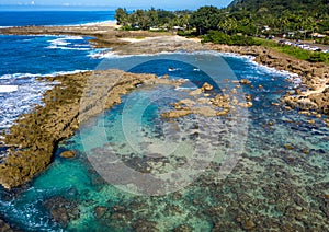 Aerial shot of the rock pools for snorkeling at Sharks Cove Hawaii