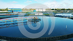 Aerial shot of round clarifiers at a sewage cleaning facility. Water management concept.