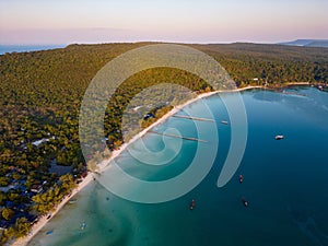 Aerial shot of the Saracen Bay surrounded by greenery in Koh Rong Samloem, Cambodia