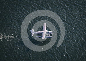 Aerial shot of a seaplane taking off from Boston Harbor.