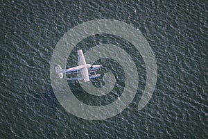 Aerial shot of a seaplane taking off from Boston Harbor.