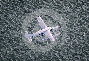 Aerial shot of a seaplane taking off from Boston Harbor.