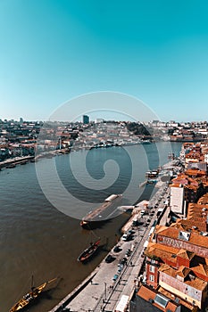 Aerial shot of the ships and boats on a harbor in Porto, a coastal city in Portugal