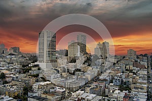 aerial shot of skyscrapers, hotels and office buildings in the city skyline, apartments, condos and cars on the street