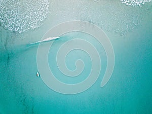 Aerial shot of surfer a lone no sharks to be seen