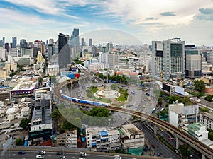 Aerial shot taken from a drone of Victory Monument. is the center of Bangkok and the movement of people in the city of Thailand