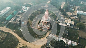 Aerial shot of temple situated in New Delhi, surrounded by colony