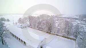 Aerial shot of the thick snow on the rooftop