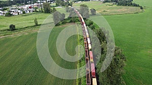 Aerial shot of a train traveling through the Chilliwack countryside