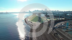 Aerial shot of a the trainyard and port facility with Downtown Vancouver in the background.