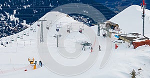 Aerial shot of Verbier, Switzerland shows snow slopes, ski lifts