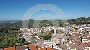 Aerial shot of the village housed and roofs under the clear sky