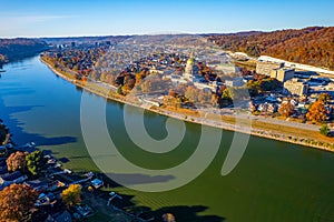 Aerial shot of the West Virginia State Capitol building and downtown Charleston in autumn.