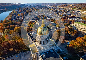 Aerial shot of the West Virginia State Capitol building and downtown Charleston in autumn.