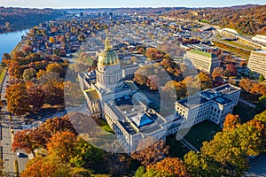 Aerial shot of the West Virginia State Capitol building and downtown Charleston in autumn.