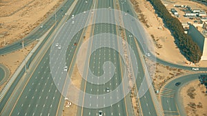 Aerial shot of a wide modern highway in Dubai, United Arab Emirates