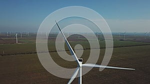 Aerial shot of wind turbines near sea
