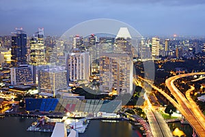 Aerial Singapore skyline night, city panorama