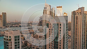 Aerial skyline of buildings in Downtown Dubai timelapse during sunset.