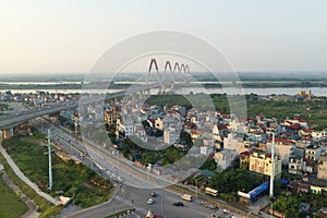 Aerial skyline view of crossroads An Duong Vuong street - Vo Chi Cong street - Au Co street to Nhat Tan bridge. Hanoi cityscape at