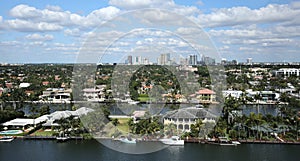 Aerial skyline view of Fort Lauderdale's Intracoastal waterway canals and residential homes.