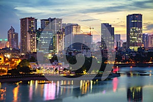 Aerial skyline view of Hanoi. Hanoi cityscape at twilight at Hoang Cau lake